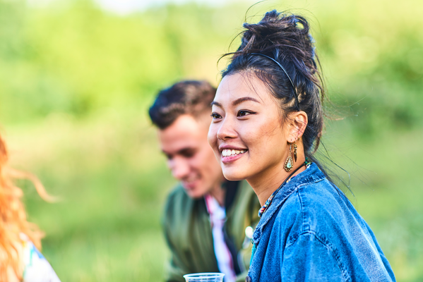 Woman smiling with her friends.