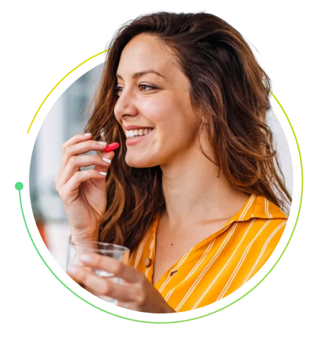 Woman preparing to take medication.